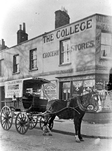 An image of a delivery cart outside a grocery store