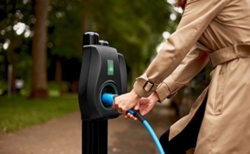 Photo of person using EV chargepoint