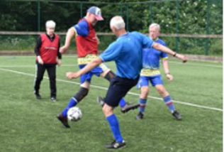 A group of men playing football

AI-generated content may be incorrect.