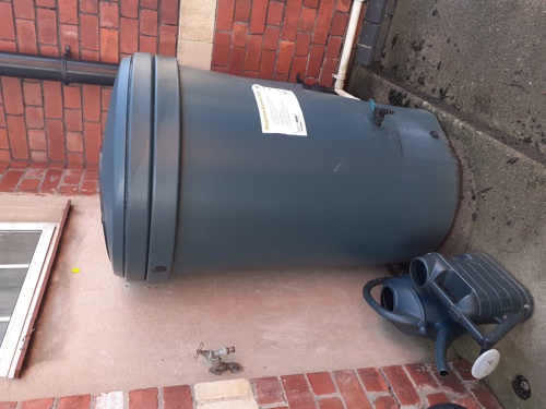 A water butt outside Gloucestershire Archives.