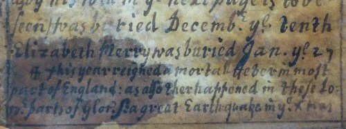 a close up of the Haresfield Parish Register, in which it is written that an earthquake occurred on Christmas.