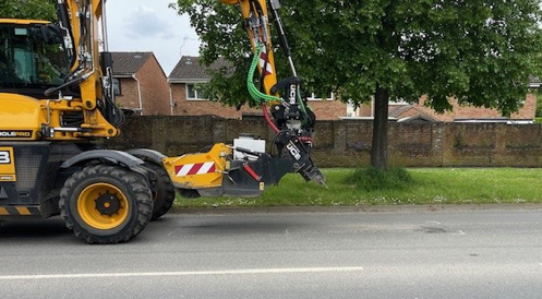 Photo of machine approaching pothole