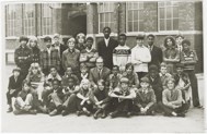 A black and white class photo