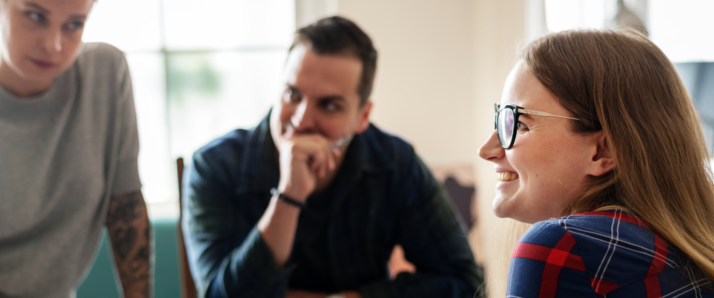 Learners talking at a table
