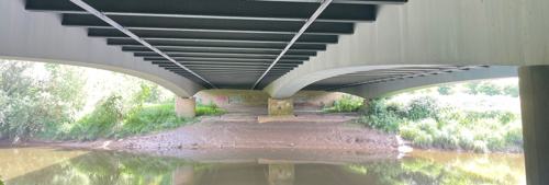 Photo taken below Over Bridge showing concrete columns