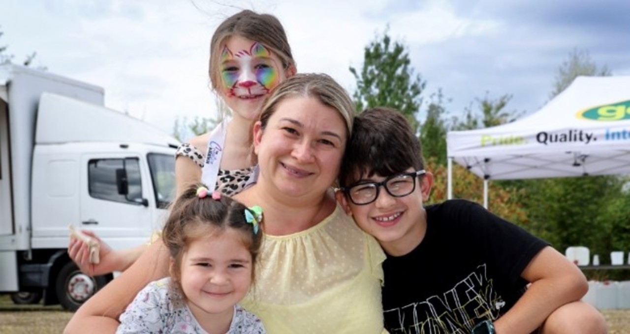 Woman and three children at a HAF event