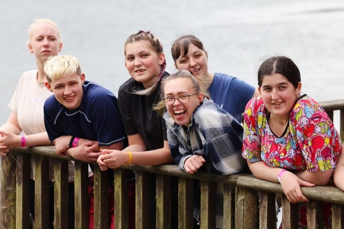 Six young adult carers enjoying a day of respite at the lake