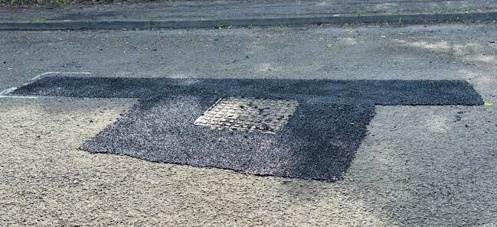 Photo of road repair in Cheltenham