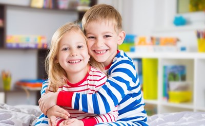 Siblings In Stripy Pjs