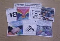 A photo of various documents from the Gloucestershire Archives, all related to LGBTQ+ history