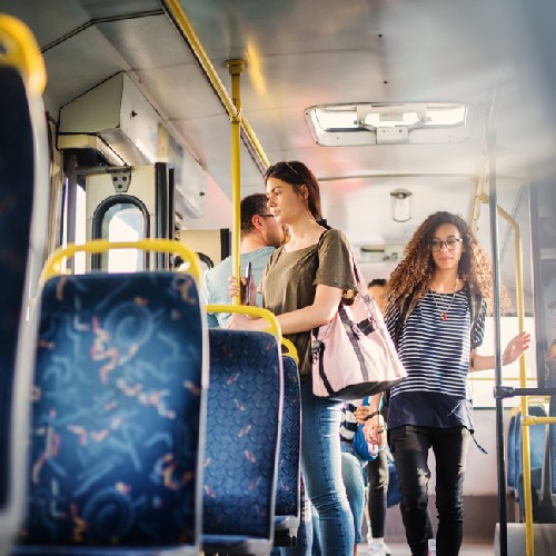 People standing on a bus