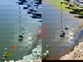 A picture of the equipment holding parts of the bridge that were in the water.